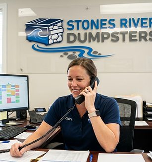 Claire, Stones River Dumpsters dispatch coordinator, taking a booking